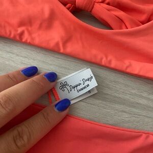 Dippin Daisy Coral Bikini Set.
